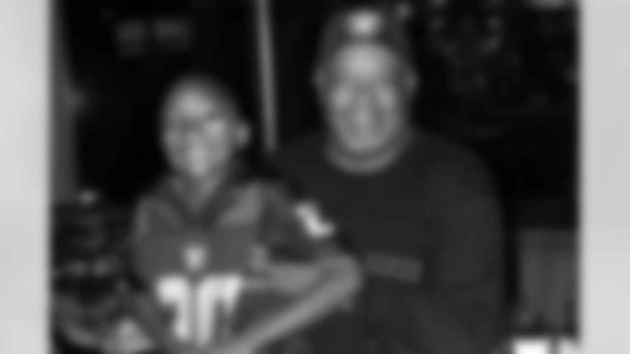 Damani with Raiders Legend George Atkinson