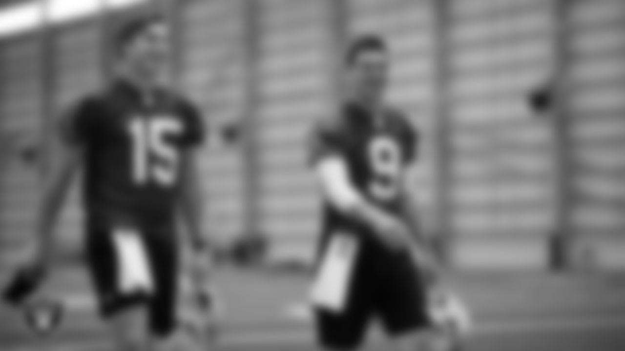 Las Vegas Raiders quarterback Chase Garbers (15) and quarterback Nick Mullens (9) at Mandatory Minicamp.
