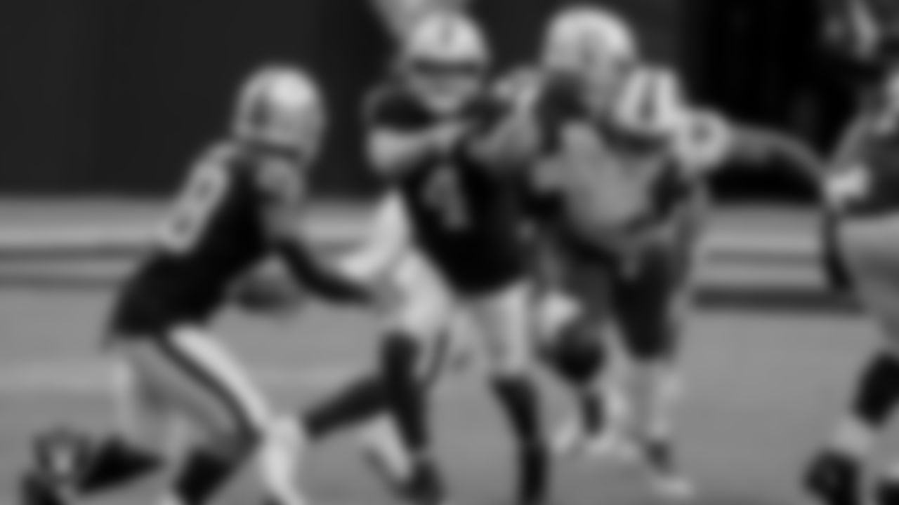Las Vegas Raiders quarterback Derek Carr (4) and running back Josh Jacobs (28) during the regular season game against the Buffalo Bills at Allegiant Stadium.
