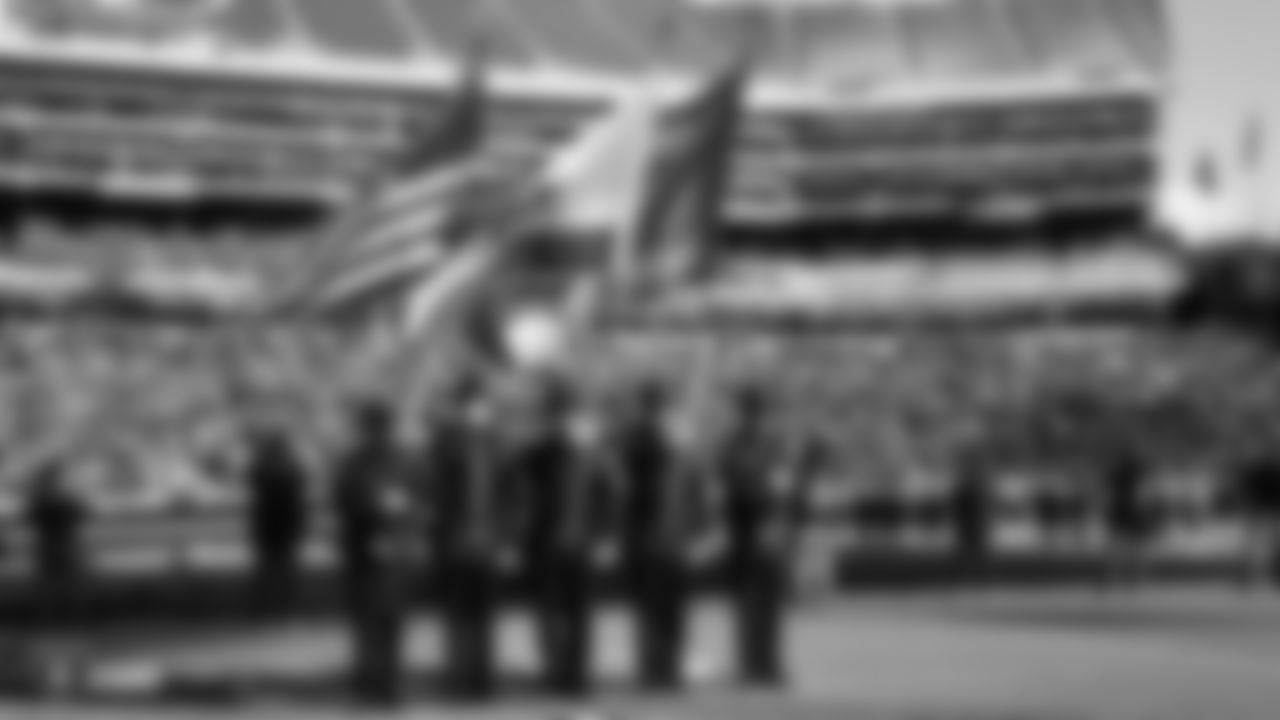 Alameda County Sherriff's Office presents the nation's colors during the national anthem before the Raiders regular season game against the Jacksonville Jaguars.
