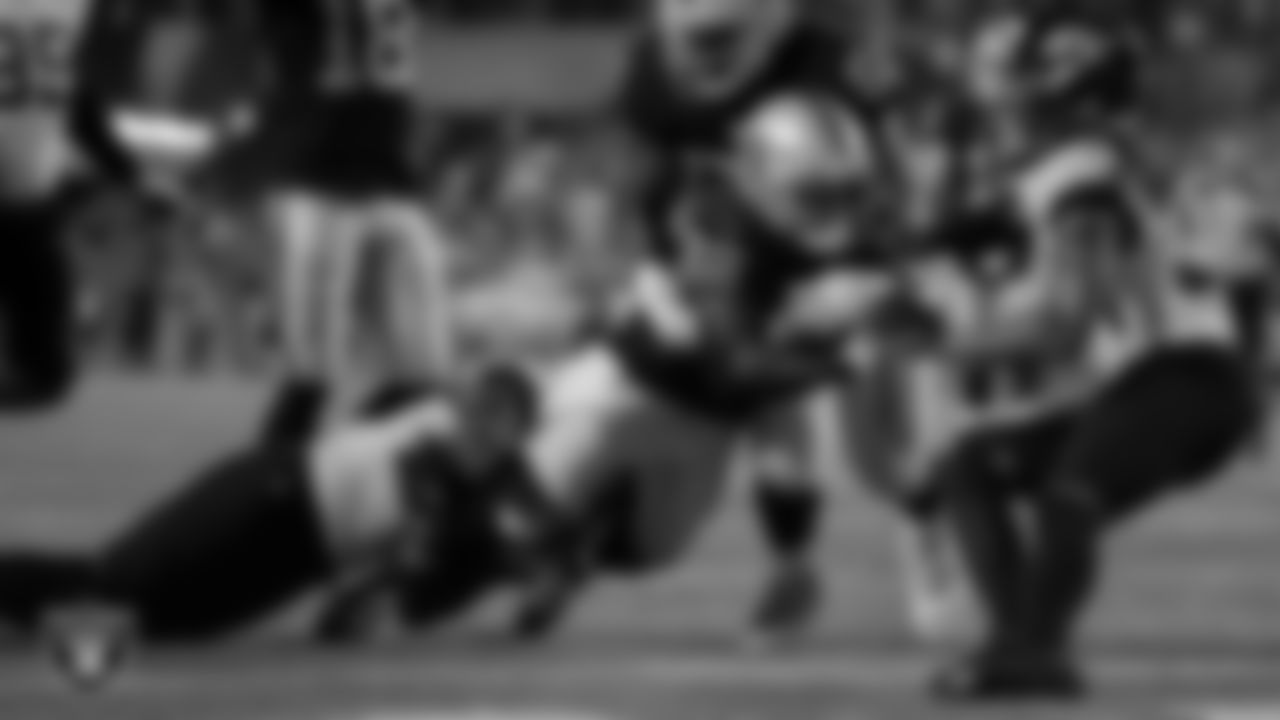Las Vegas Raiders running back Austin Walter (32) rushes for an 8-yard touchdown during the Hall of Fame Game against the Jacksonville Jaguars at Tom Benson Hall of Fame Stadium.