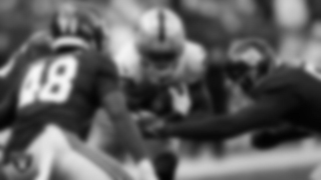 Las Vegas Raiders running back Kenyan Drake (23) runs after making a catch during the regular season away game against the New York Giants.
