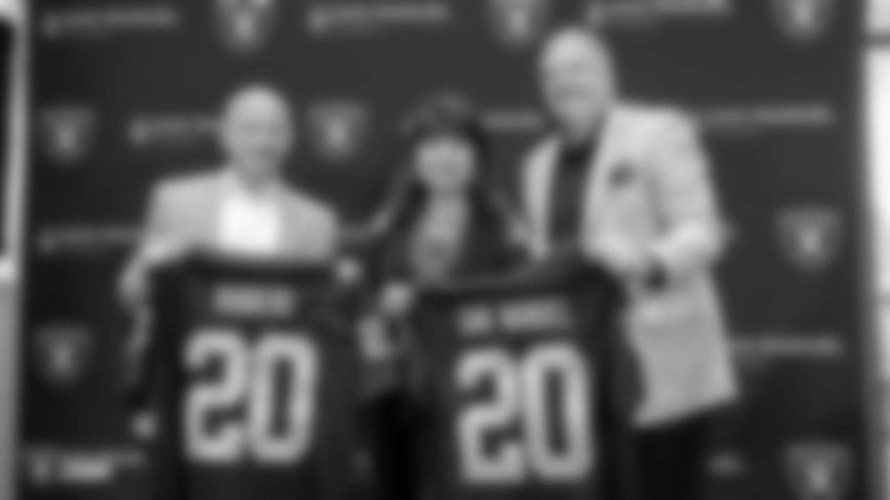 Raiders President Marc Badain, San Manuel Band of Mission Indians Chairwoman Lynn Valbuena and CEO Loren Gill pose for a photo at a private event celebrating San Manuel Band of Mission Indians' new partnership with Allegiant Stadium and the Raiders.