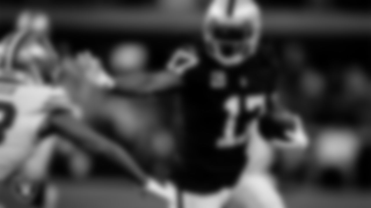 Las Vegas Raiders wide receiver Davante Adams (17) runs after making a catch during the regular season home game against the San Francisco 49ers at Allegiant Stadium.