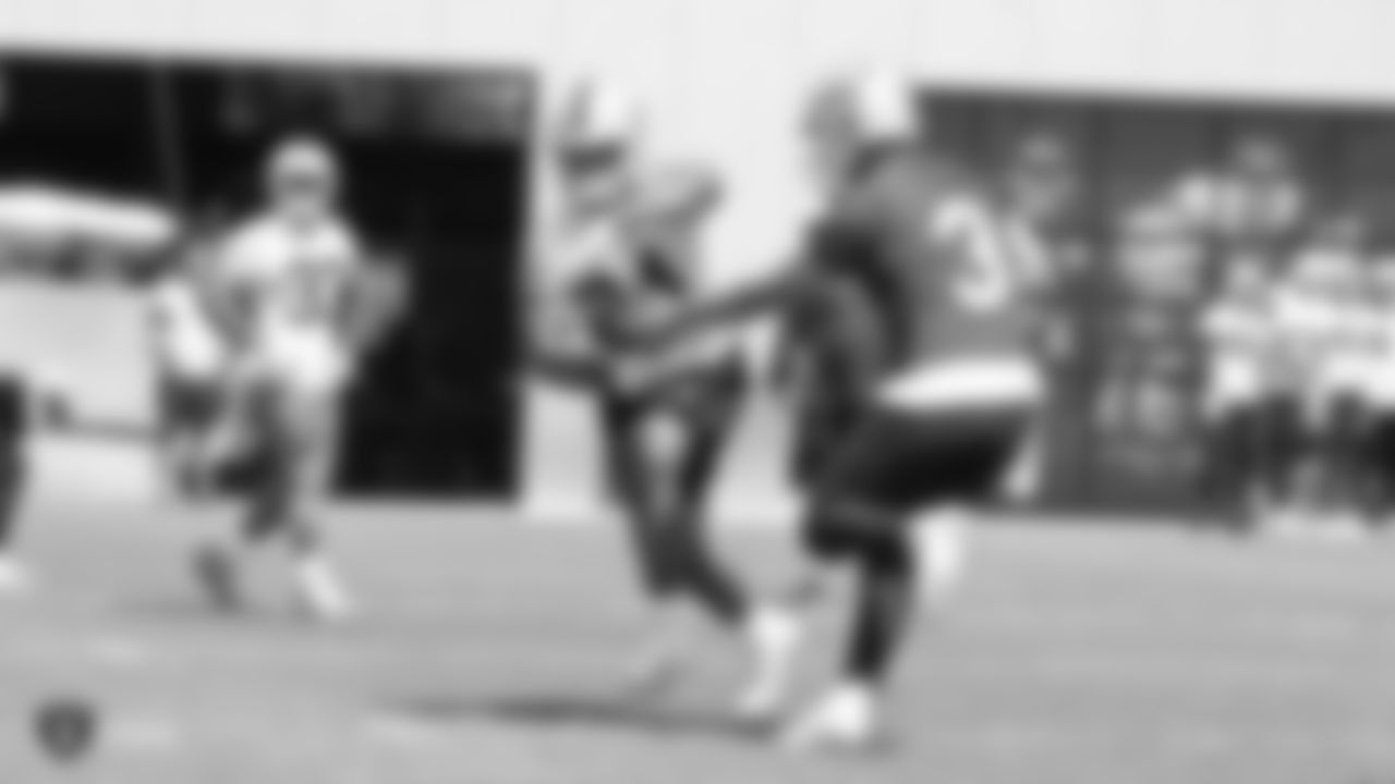 Raiders running back Chris Warren III (34) and quarterback Nathan Peterman (3) an Organized Team Activity (OTA) at the Raiders Practice Facility in Alameda, Calif.