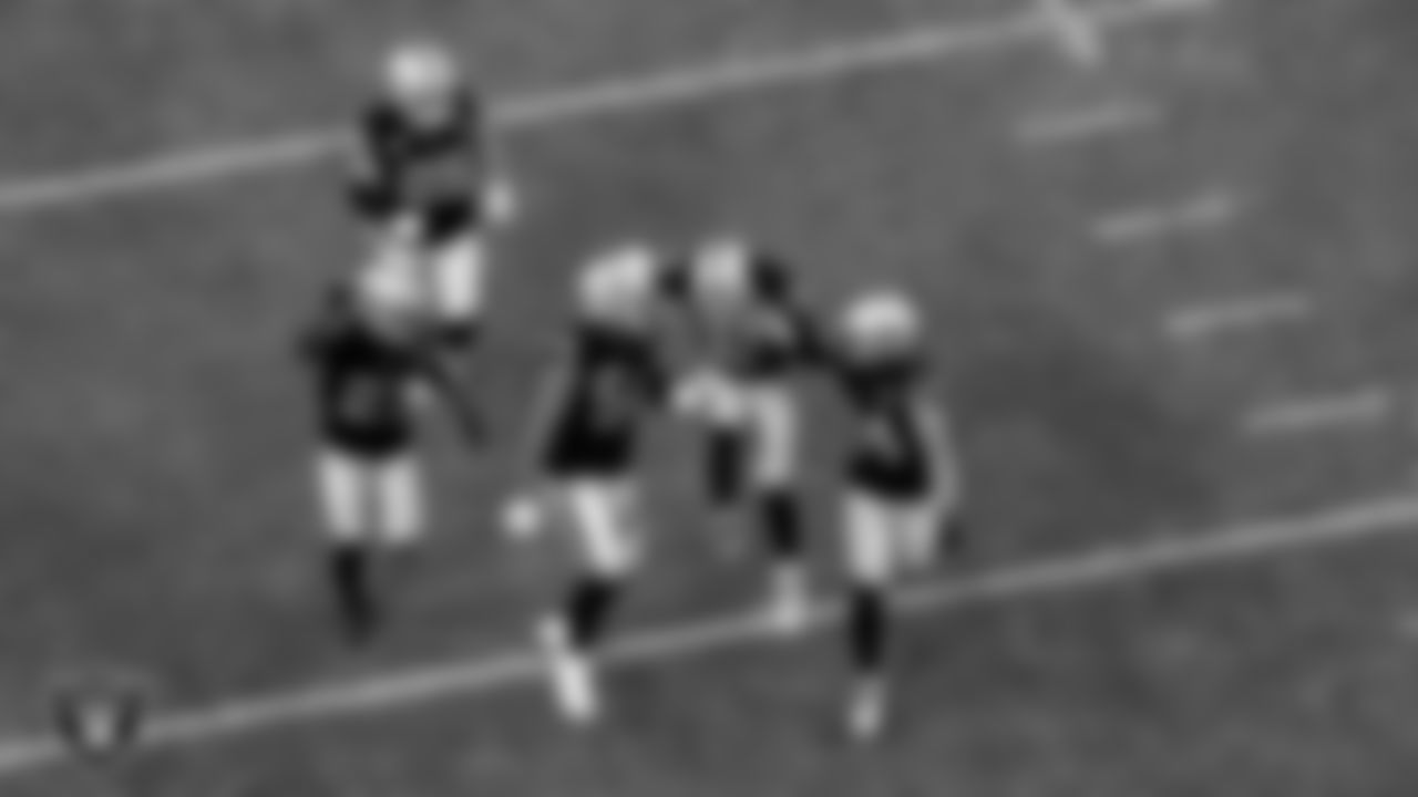 Las Vegas Raiders safety Jeff Heath (38) is congratulated by teammates after intercepting a pass during the regular season home game against the Denver Broncos.