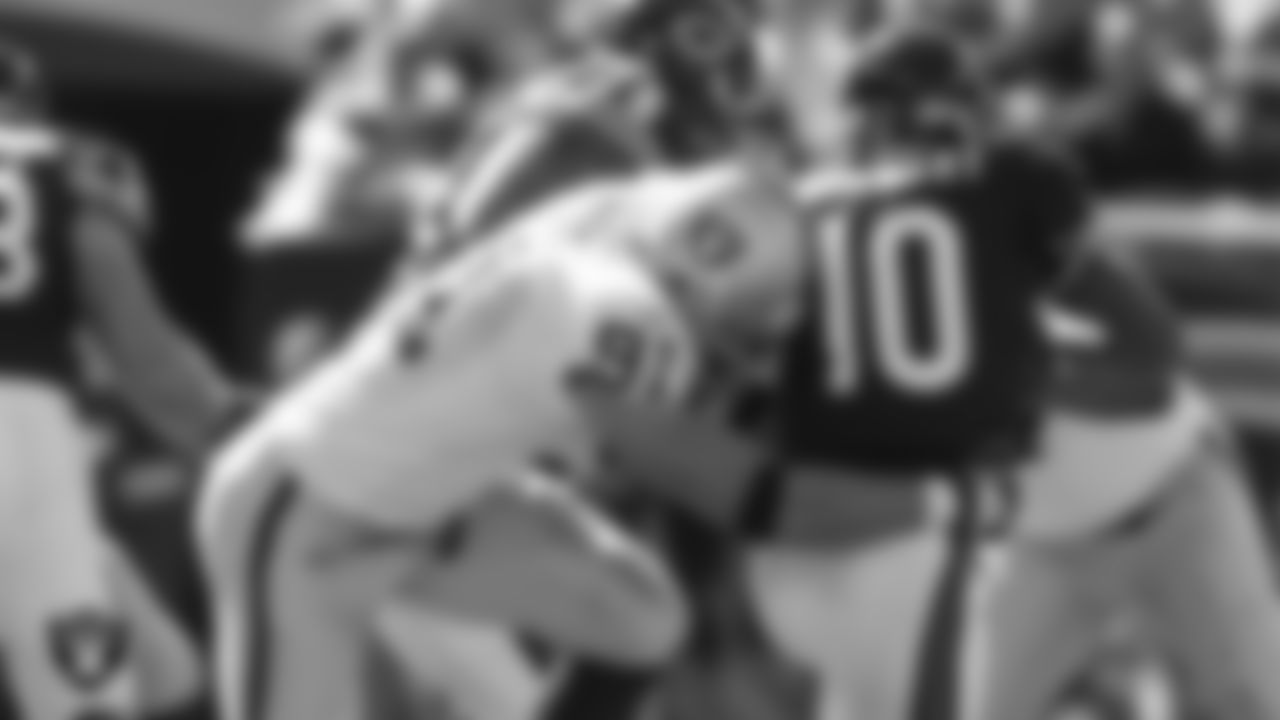 Oakland Raiders defensive end Tyler Brayton (91) sacks the quarterback during the regular season away game against the Chicago Bears at Soldier Field, Sunday, October 5, 2003, in Chicago, Ill.