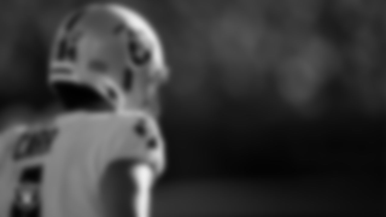 Las Vegas Raiders quarterback Derek Carr (4) on the sidelines during the regular season away game against the Denver Broncos.