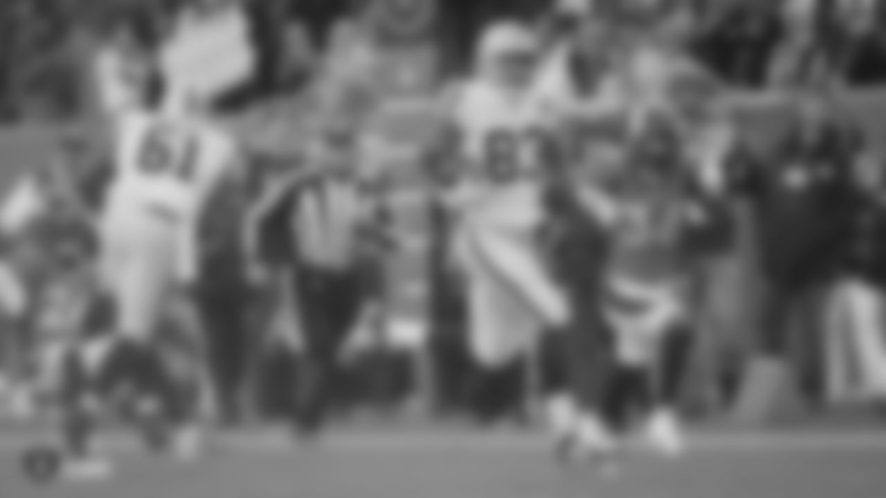 The Raiders during the regular season game against the Denver Broncos at Empower Field at Mile High.
