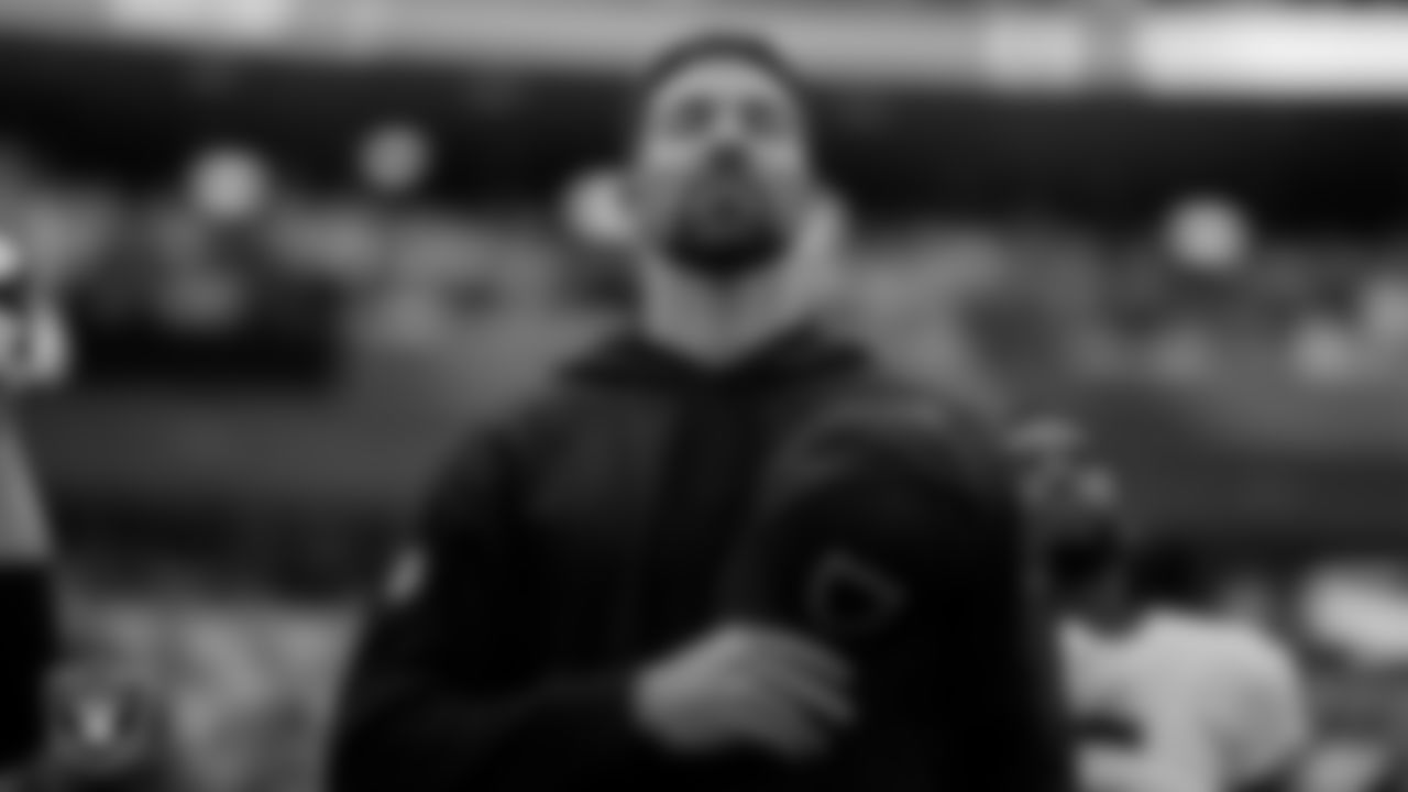 Las Vegas Raiders defensive line coach Rob Leonard during the national anthem before the regular season away game against the Los Angeles Chargers at SoFi Stadium.
