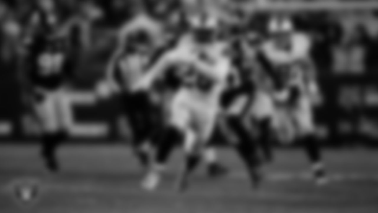 Las Vegas Raiders running back Josh Jacobs (28) rushes during the regular season away game against the Pittsburgh Steelers at Acrisure Stadium.