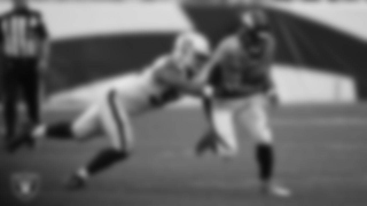 Las Vegas Raiders defensive lineman Jerry Tillery (90) sacks the quarterback during the regular season away game against the Denver Broncos at Empower Field at Mile High.