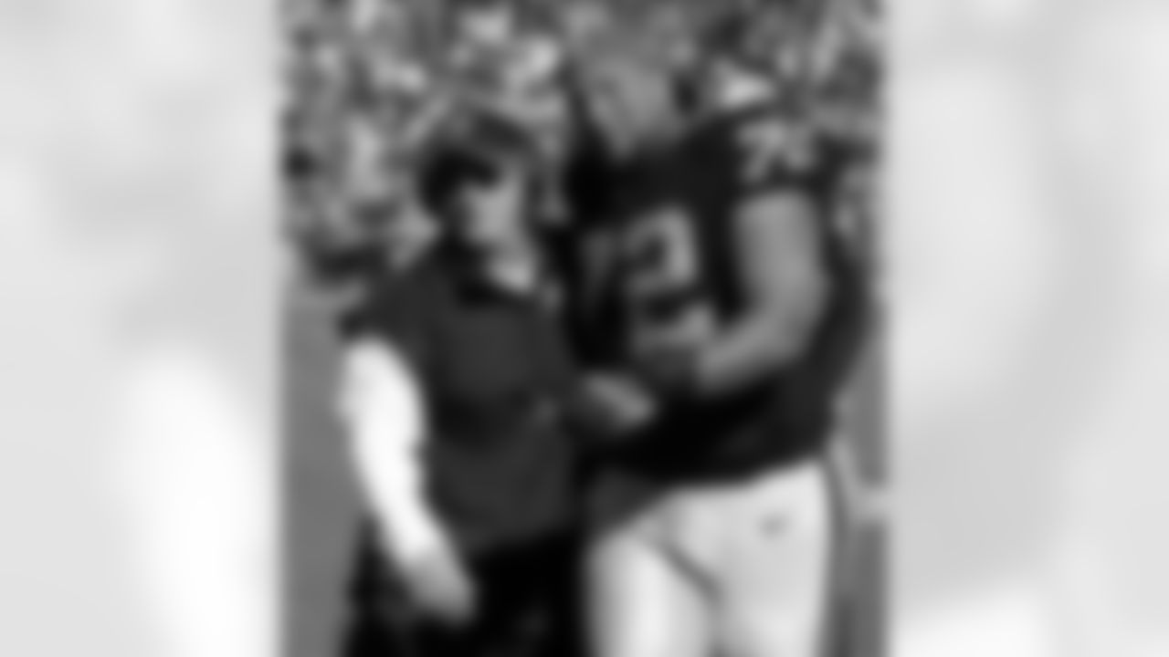Interim Head Coach Tony Sparano and T Donald Penn