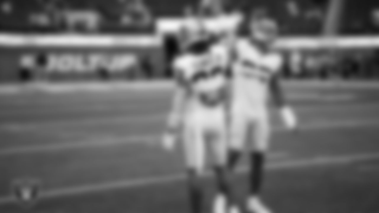Las Vegas Raiders safety Roderic Teamer (33) and safety Tre'von Moehrig (25) warming up before the regular season away game against the Los Angeles Chargers at SoFi Stadium.