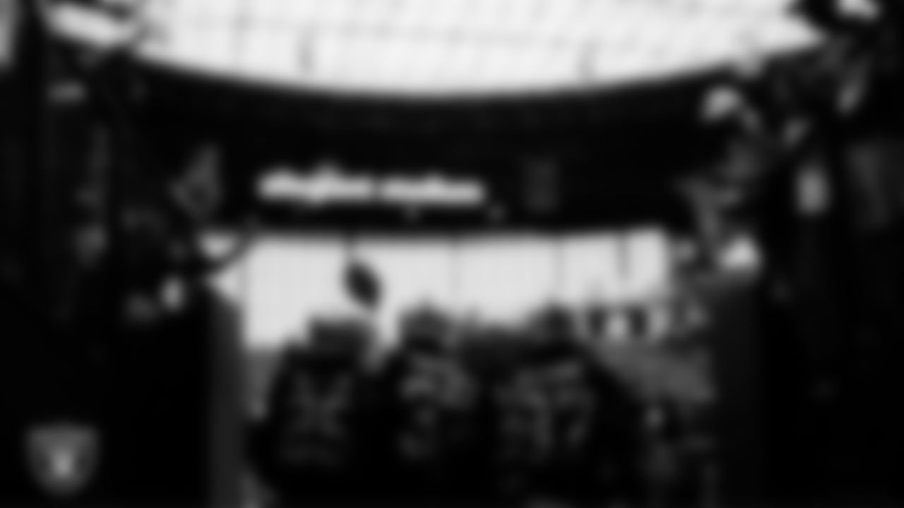 The Las Vegas Raiders defensive backs huddle in the tunnel before the regular season home game against the Chicago Bears.