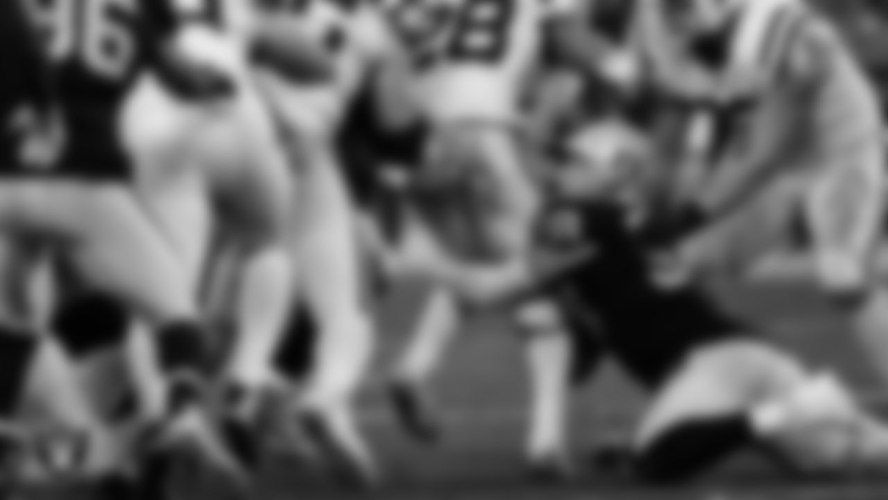 Las Vegas Raiders defensive end Maxx Crosby (98) makes a tackle during the regular season home game against the Indianapolis Colts at Allegiant Stadium.