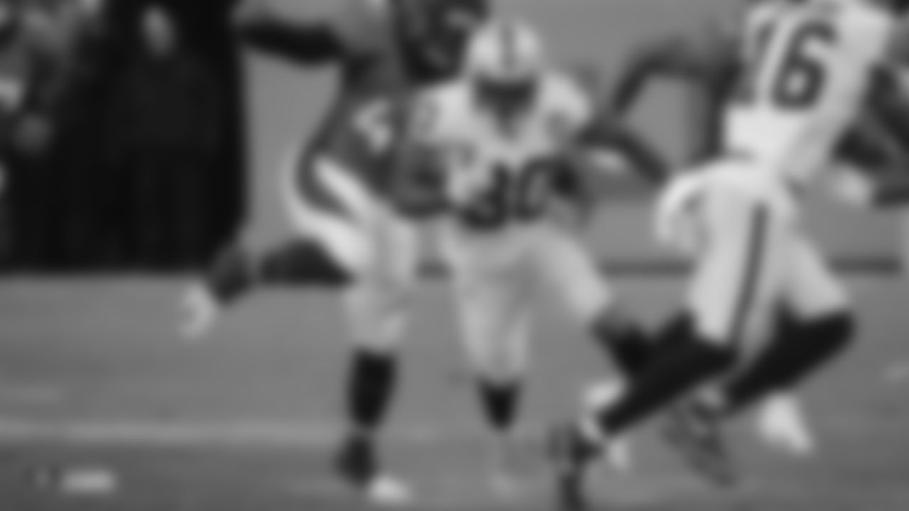 The Raiders during the regular season game against the Denver Broncos at Empower Field at Mile High.