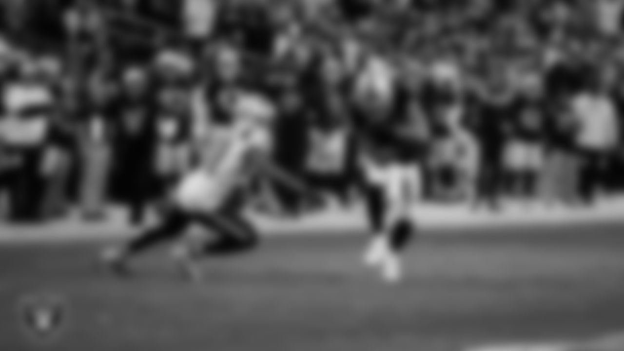 Las Vegas Raiders wide receiver Mack Hollins (10) runs after making a catch during the regular season home game against the New England Patriots at Allegiant Stadium.