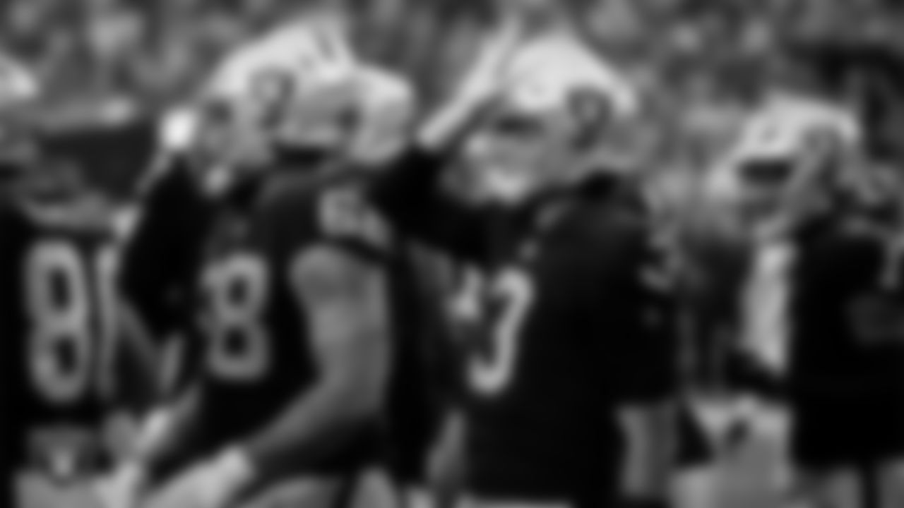 Las Vegas Raiders quarterback Jarrett Stidham (3) celebrates after rushing for a 4-yard touchdown during the preseason home game against the Minnesota Vikings at Allegiant Stadium.