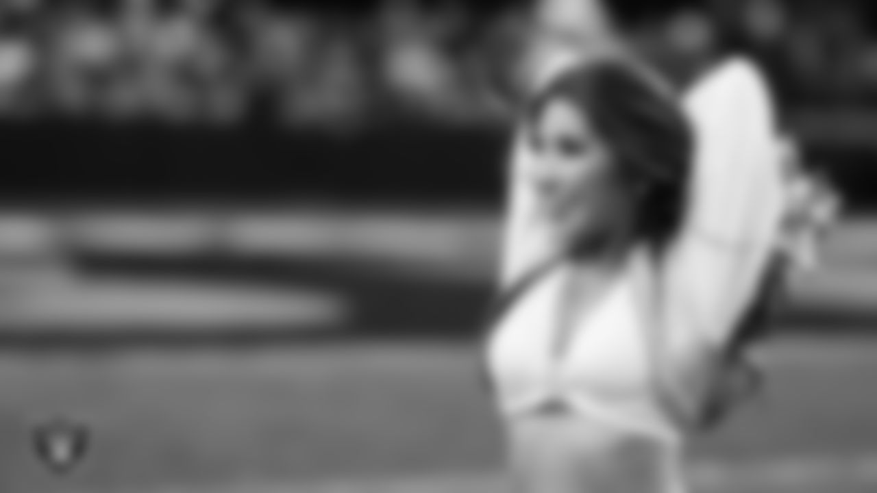Raiderette Katsura performs on the field during the regular season home game against the Los Angeles Chargers at Allegiant Stadium.