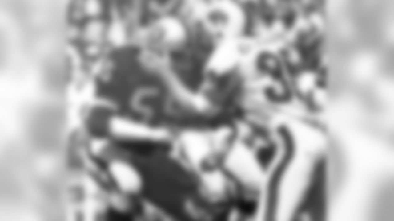 Dan Conners collides with a Buffalo blocker.