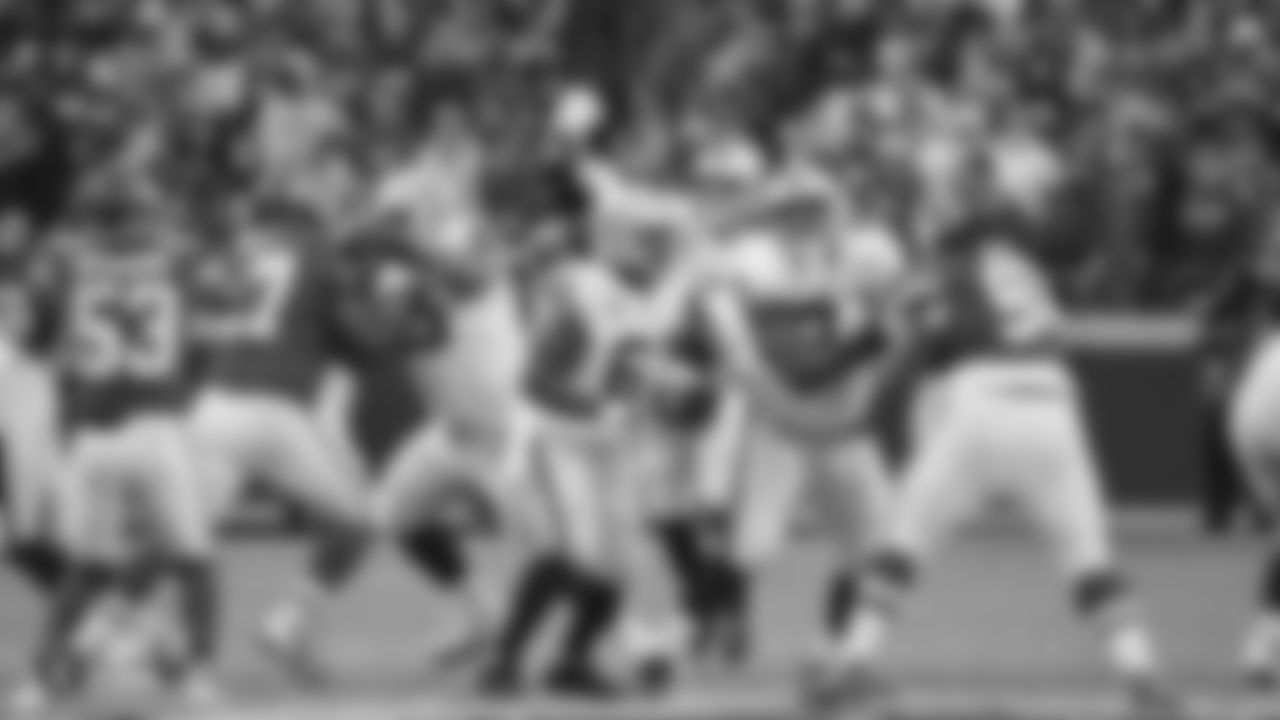 Oakland Raiders guard/tackle Denzelle Good (69), center Rodney Hudson (61), quarterback Derek Carr (4), and guard/tackle Kelechi Osemele (70) during the Oakland Raiders regular season game against the Kansas City Chiefs at Arrowhead Stadium, Sunday, December 30, 2018, in Kansas City, Missouri. The Oakland Raiders lost 35-3.