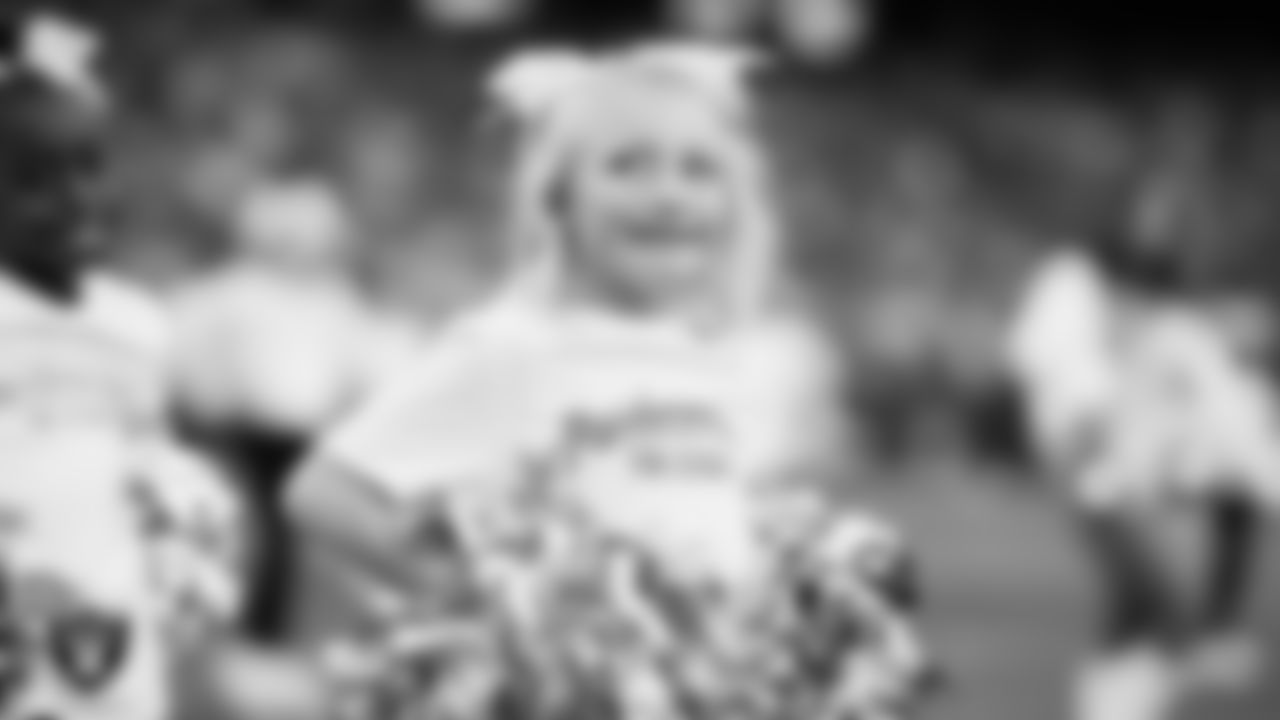 The Raiderettes and Junior Raiderettes perform on the field before the regular season home game against the Los Angeles Chargers at Allegiant Stadium.