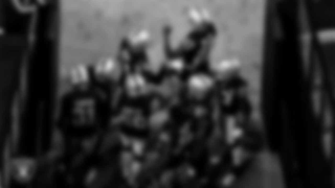 The Las Vegas Raiders defensive backs huddle in the tunnel before the regular season home game against the Miami Dolphins.