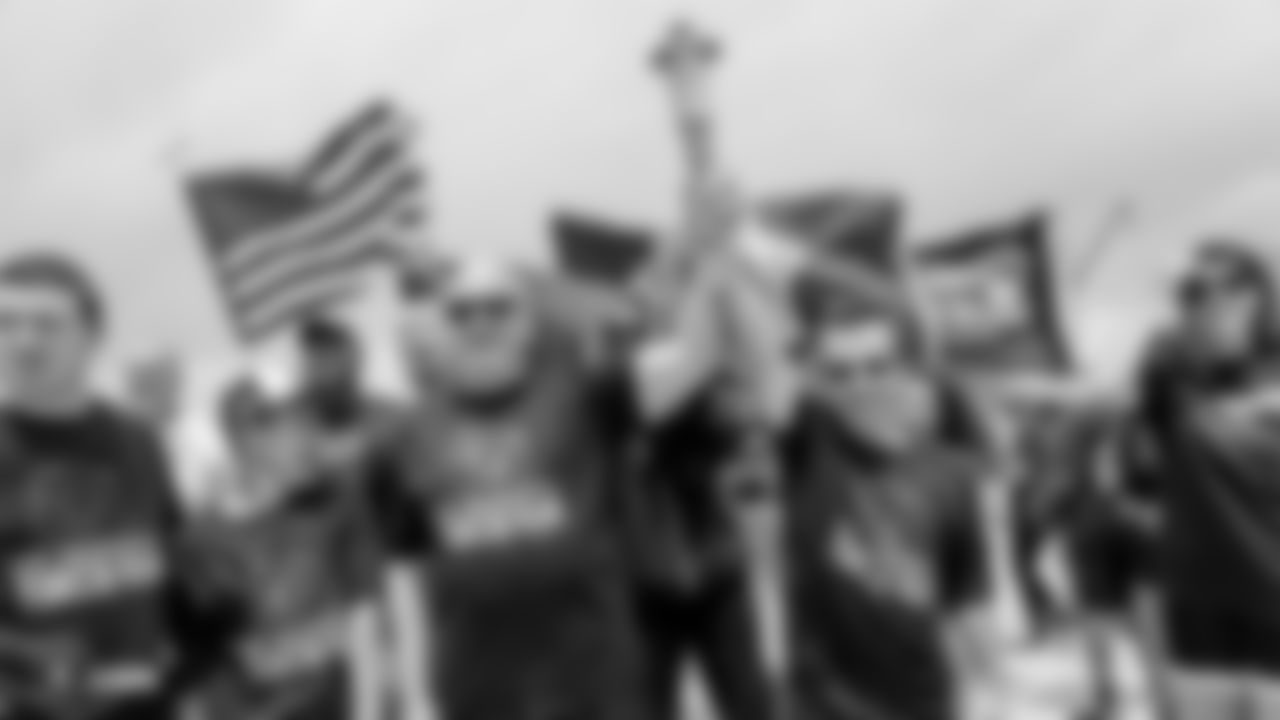 The Southern Nevada Law Enforcement Torch Run partners with the Raiders, represented by alumni Jerry Robinson and Steve Wisniewski, and the Raiderettes, to support Special Olympics Nevada by spending time with its runners and athletes at a fun-filled pit stop along the run.