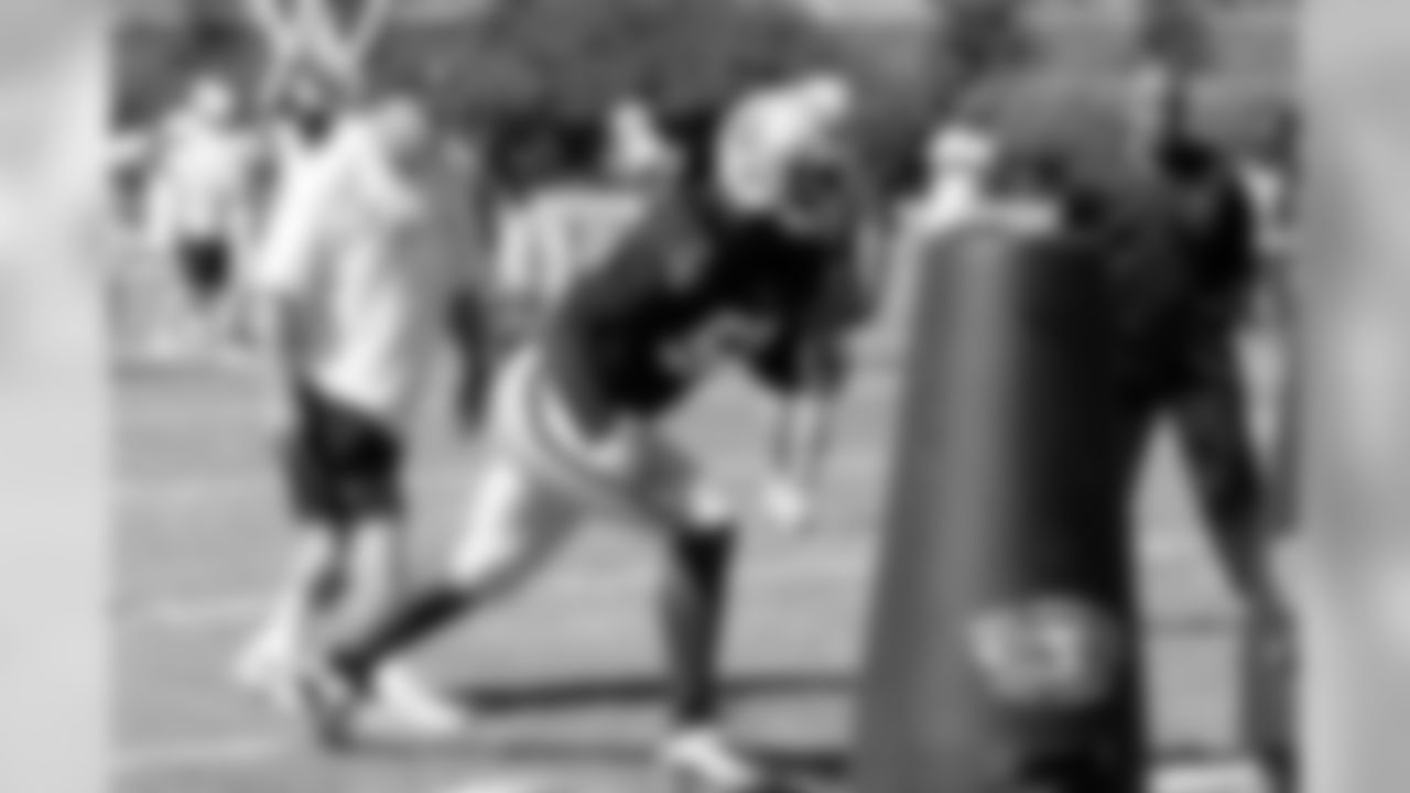 Rookie LB Rolando McClain gets ready to hit the bag. Photo by Tony Gonzales.