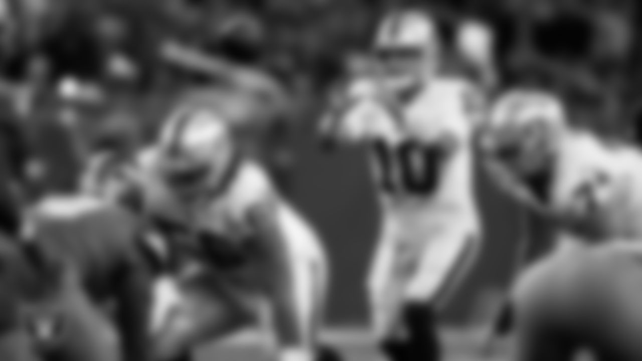 Las Vegas Raiders quarterback Jimmy Garoppolo (10) receives the snap during the regular season away game against the Detroit Lions at Ford Field.