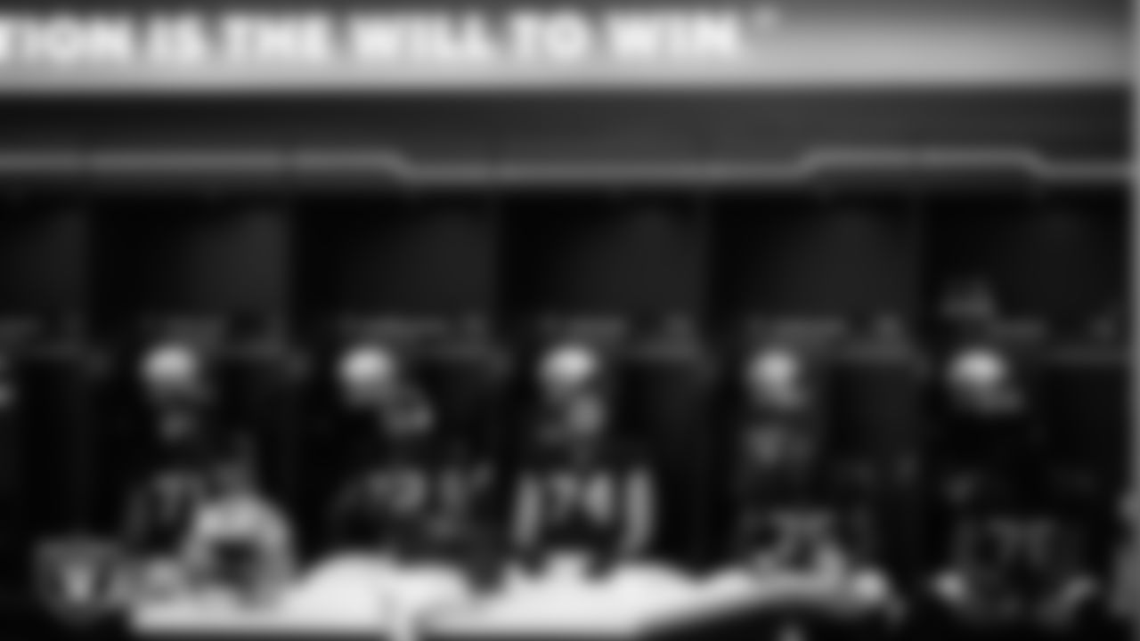 Las Vegas Raiders guard Denzelle Good (71), offensive lineman Jermaine Eluemunor (72), tackle Kolton Miller (74), tackle Brandon Parker (75) and guard John Simpson (76) in the locker room before the regular season home game against the Baltimore Ravens.