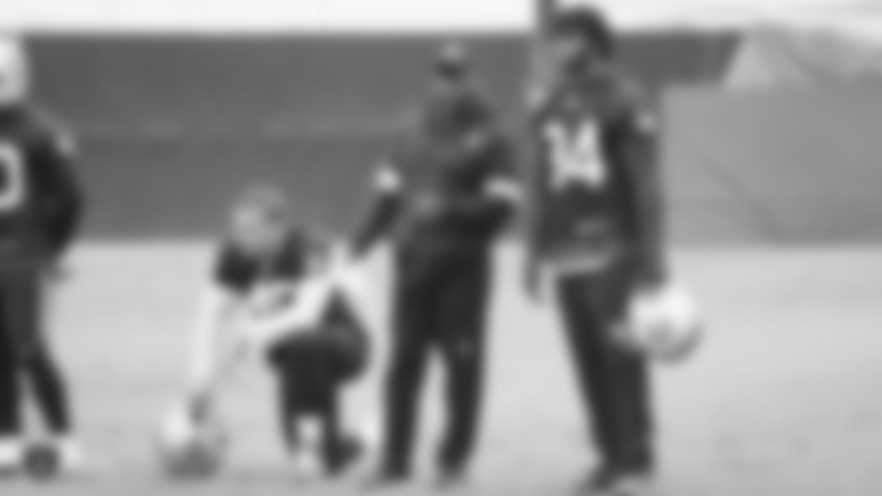 Raiders fullback Alec Ingold (45), running backs coach Kirby Wilson and running back Rod Smith (34) on the field during practice.