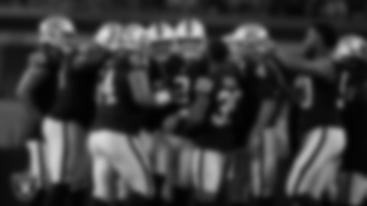 Las Vegas Raiders kicker Daniel Carlson (2) is congratulated after kicking a 62-yard field goal during the preseason away game against the Dallas Cowboys at AT&T Stadium.