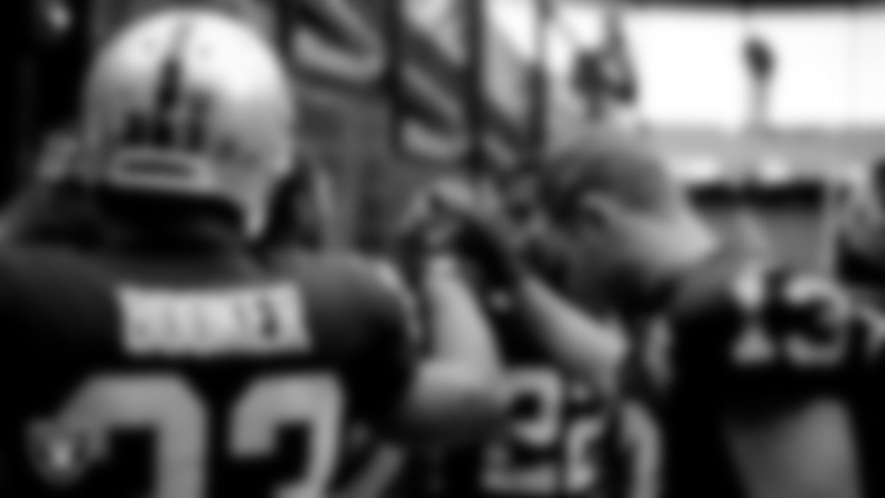 The Raiders special teams returners huddle before the regular season game against the Denver Broncos at Allegiant Stadium.