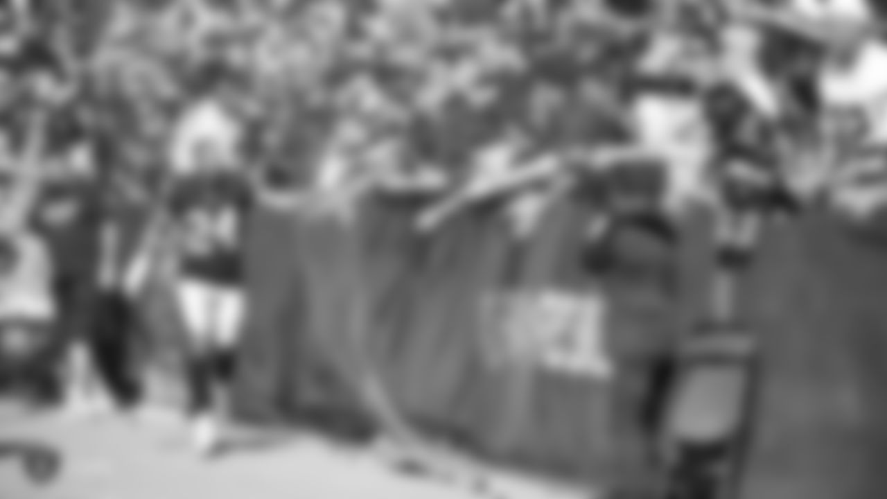 Raiders safety Johnathan Abram (24) with fans before the Raiders preseason game against the Los Angeles Rams.