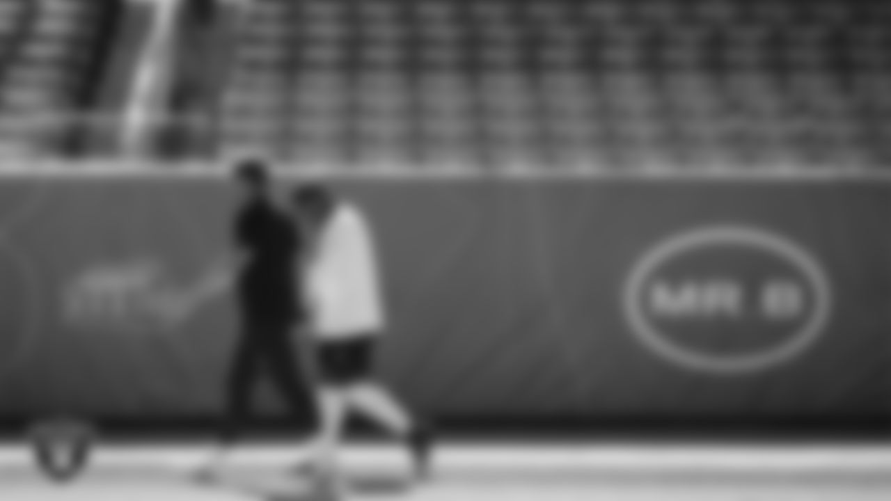 Las Vegas Raiders fullback Alec Ingold (45) and running back Josh Jacobs (28) warming up before the regular season away game against the Denver Broncos.