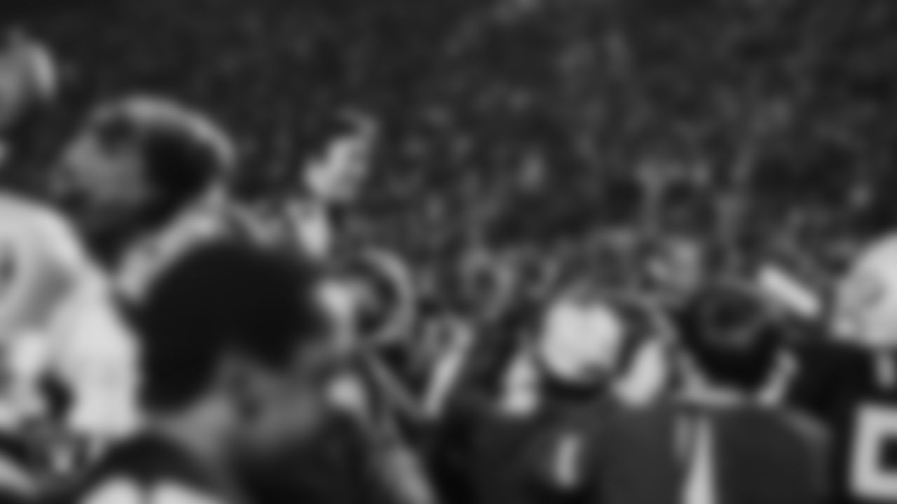 Raiders Head Coach Tom Flores is carried on on the field after Super Bowl XVIII against the Washington Football Team at Tampa Stadium, Sunday, January 22, 1984, in Tampa, Fla. The Raiders won 38-9.