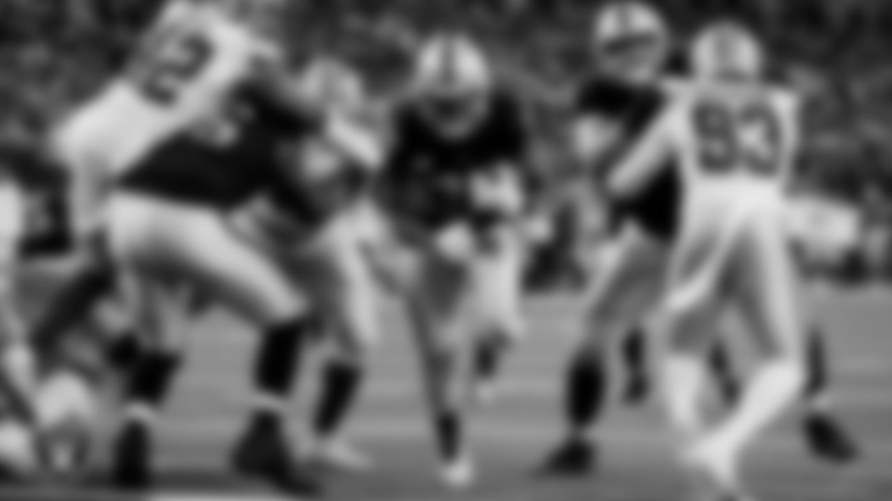 Las Vegas Raiders running back Josh Jacobs (28) rushes for a 1-yard touchdown during the regular season away game against the Dallas Cowboys.