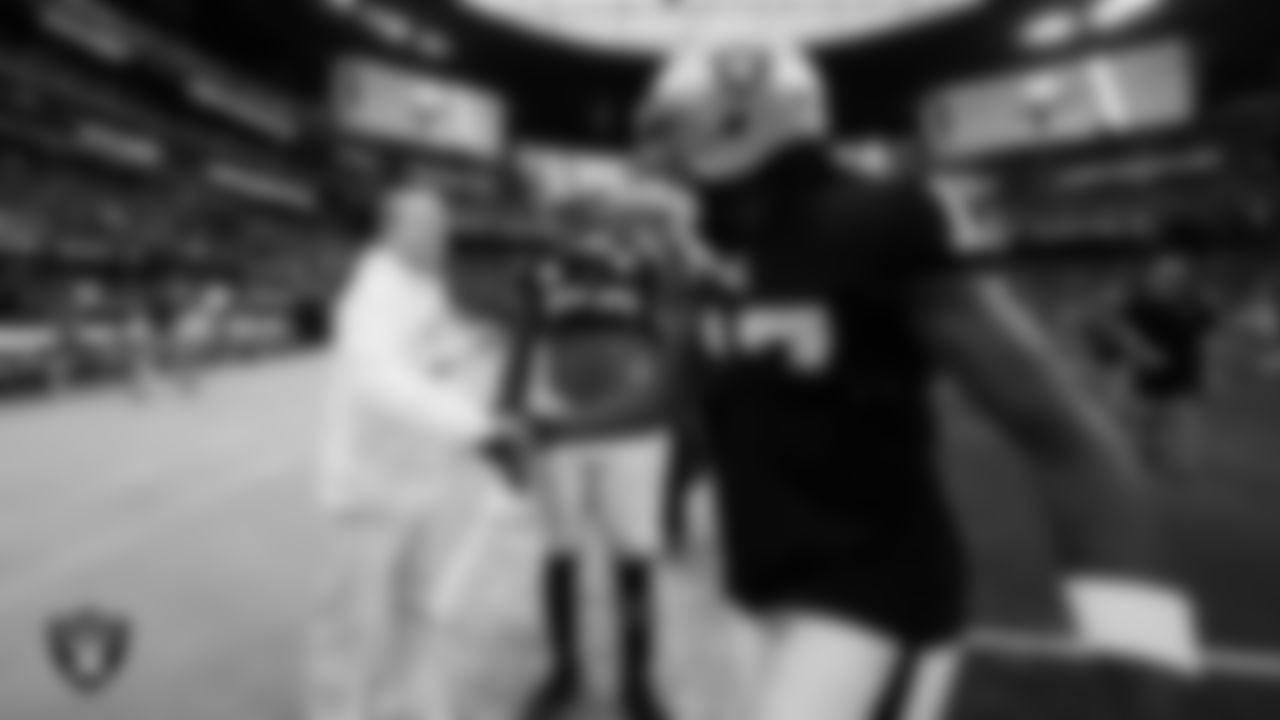Las Vegas Raiders Owner Mark Davis and wide receiver Davante Adams (17) before the regular season home game against the New England Patriots at Allegiant Stadium.