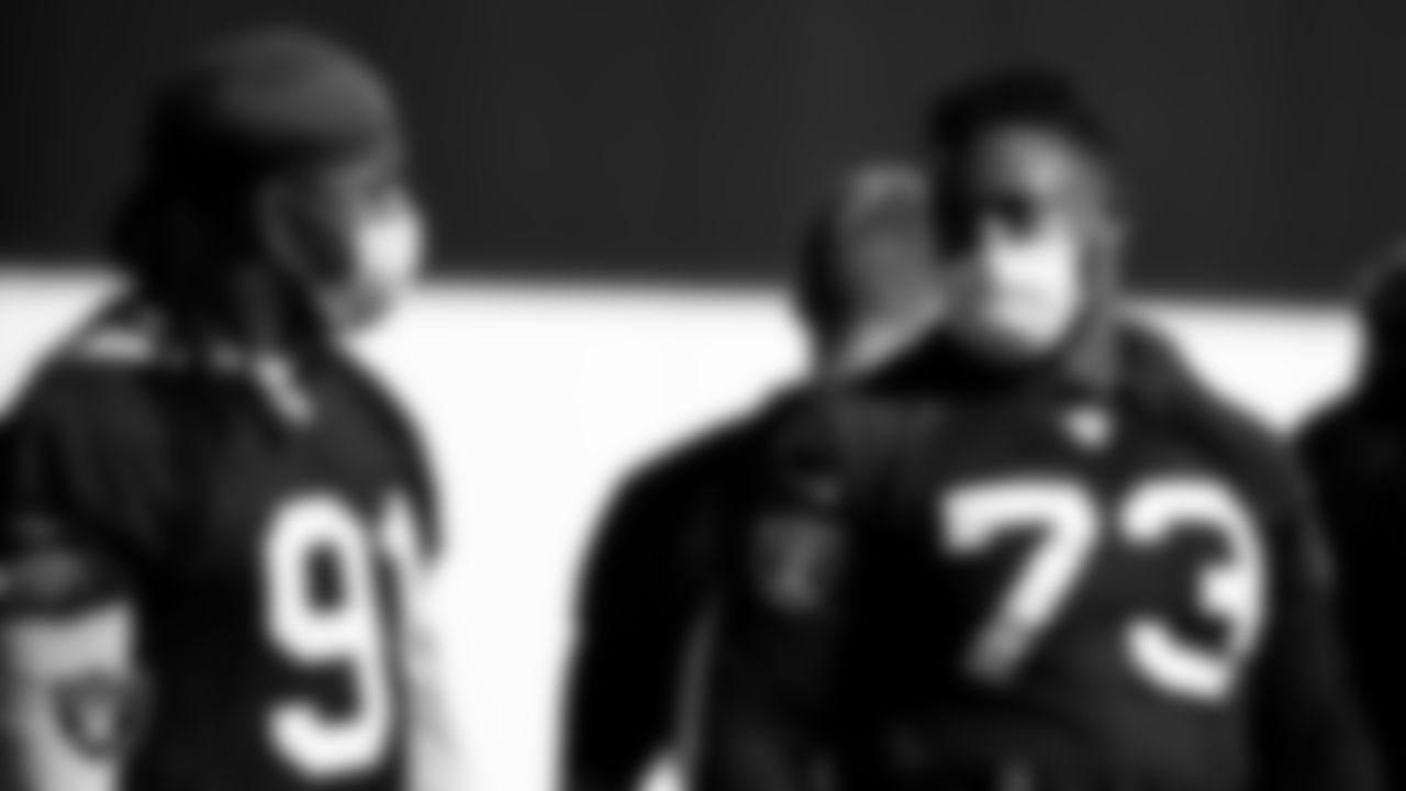 Las Vegas Raiders defensive end Kendal Vickers (91) and defensive tackle Maurice Hurst (73) during practice.
