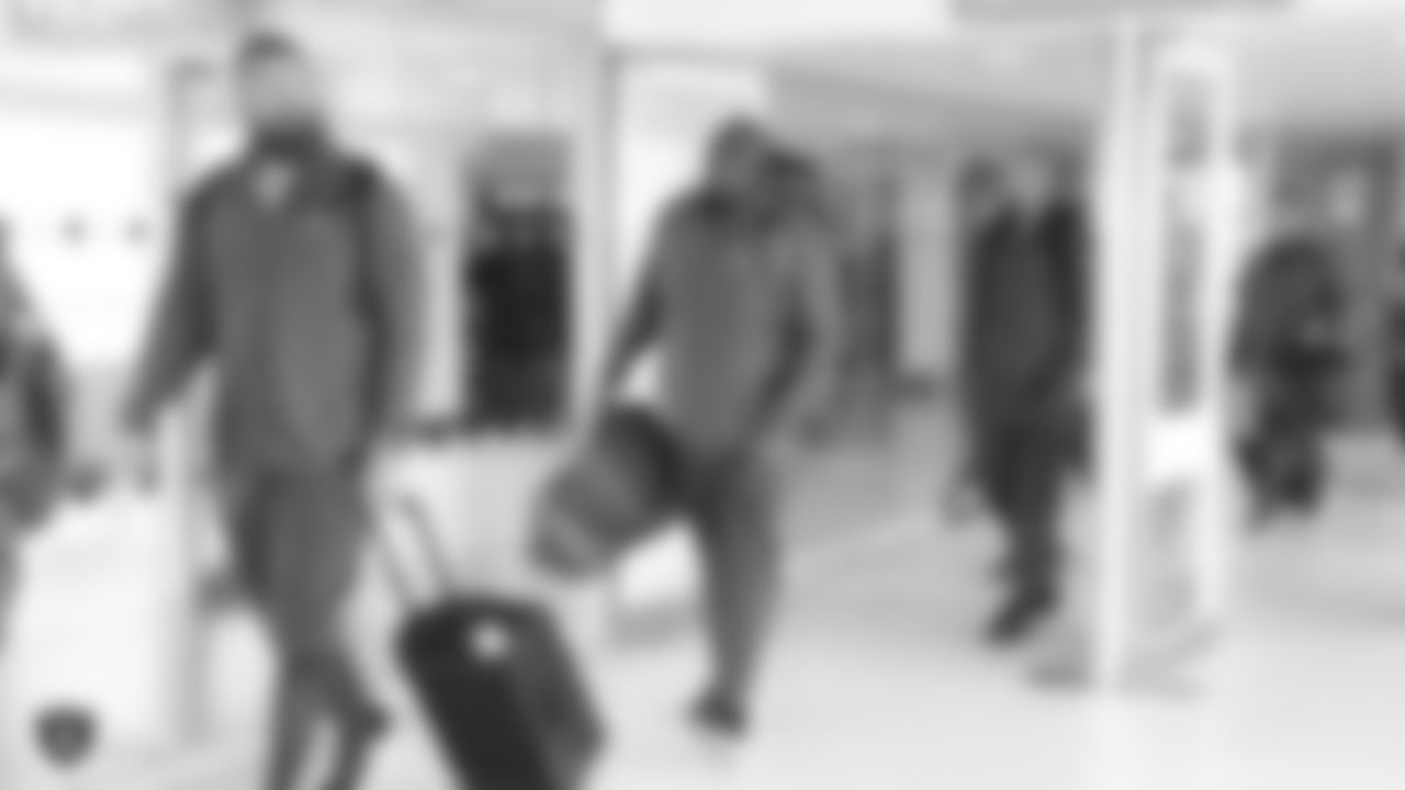Oakland Raiders tight end Lee Smith (86) and center Rodney Hudson (61) arrive at Heathrow Airport three days before their game against the Seattle Seahawks, Friday, October 12, 2018, in London, England.