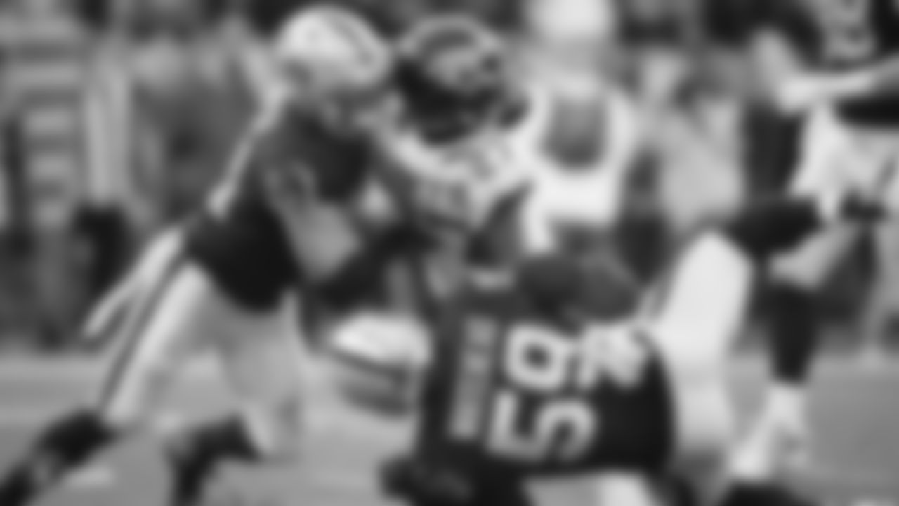 Raiders linebacker Will Compton (51) and linebacker Tahir Whitehead (59) make a tackle during the regular season game against the Jacksonville Jaguars.