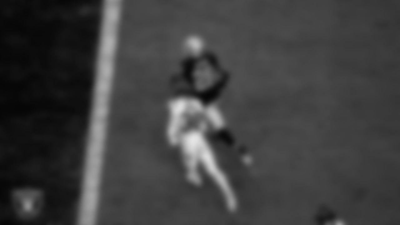 Las Vegas Raiders running back Josh Jacobs (28) rushes for a 15-yard touchdown during the regular season home game against the Houston Texans at Allegiant Stadium.