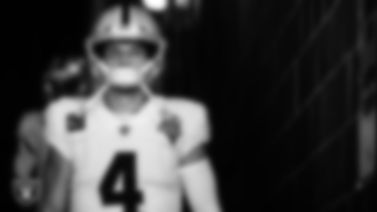 Las Vegas Raiders quarterback Derek Carr (4) walks down the tunnel before the regular season away game against the New York Jets.