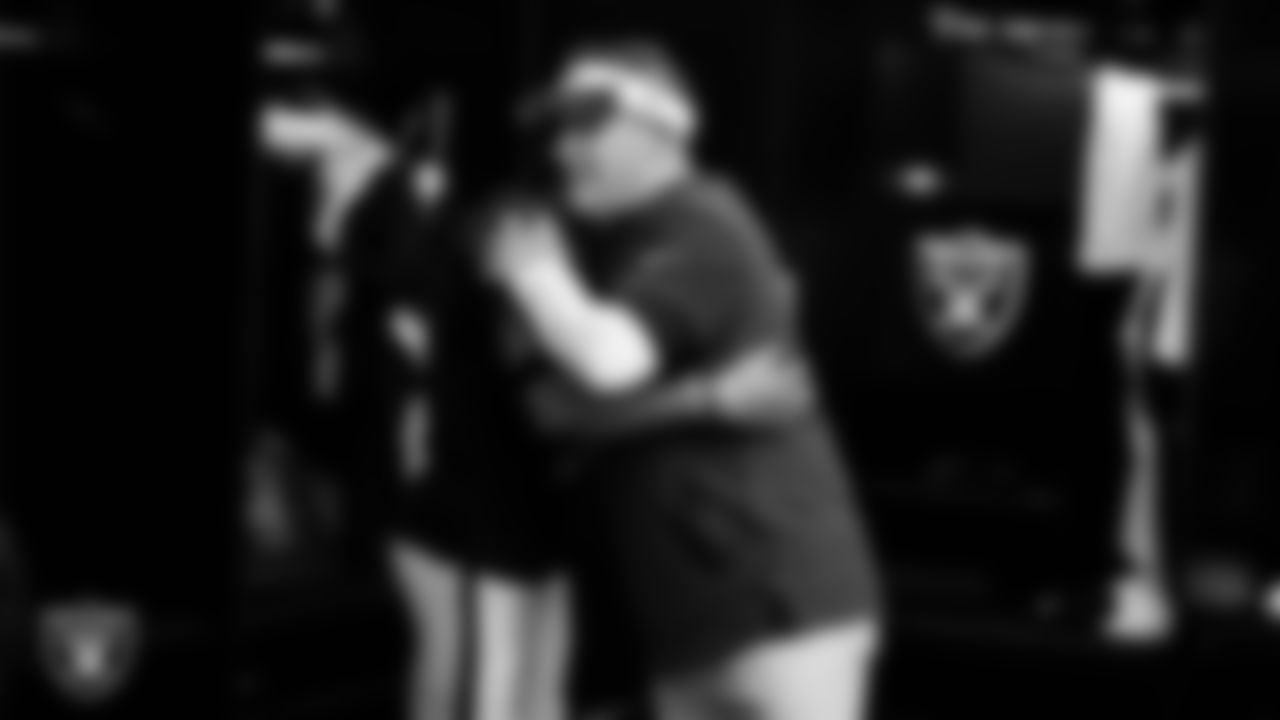 Las Vegas Raiders wide receiver Tre Tucker (11) and Head Coach Josh McDaniels in the locker room after the regular season home game against the New England Patriots at Allegiant Stadium.