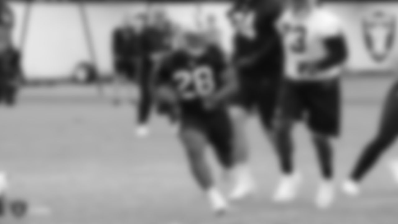 Raiders running back Josh Jacobs (28) on the field for practice.