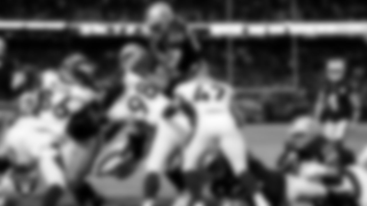 Raiders running back Josh Jacobs (28) rushes for a 2-yard touchdown during the regular season home game against the Denver Broncos at Oakland-Alameda County Coliseum, Monday, September 9, 2019, in Oakland, Calif.