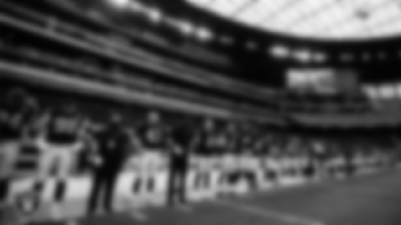The Las Vegas Raiders during the national anthem before the regular season home game against the Tampa Bay Buccaneers.