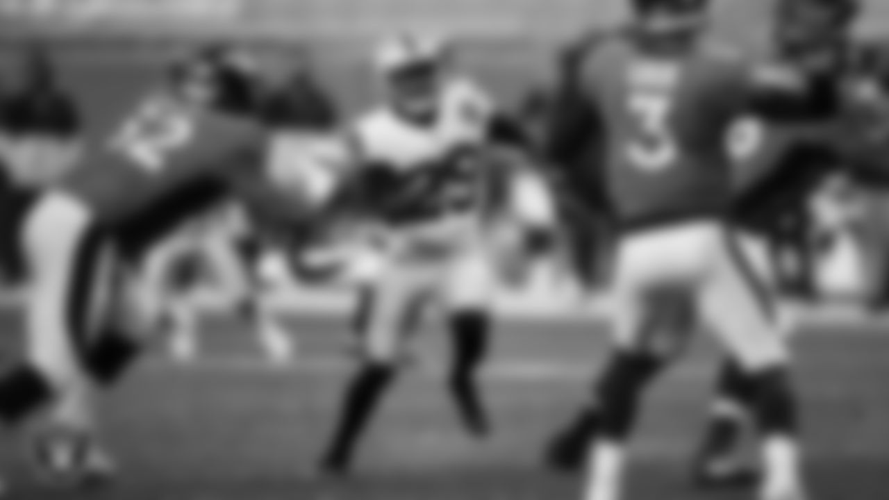 Las Vegas Raiders safety Lamarcus Joyner (29) rushes the quarterback during the regular season away game against the Denver Broncos.